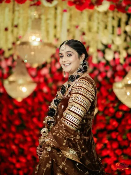 Another beautiful portrait of this royal look. The side-swept braid and defined makeup create a look of timeless elegance for the special occasion.