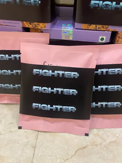 A look at the custom merchandise I curated for the cast and crew of the Bollywood movie 'Fighter', including these branded pouches.