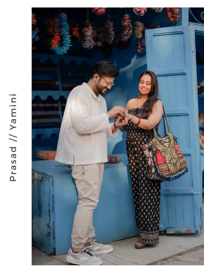 The couple shares a smile while looking at bangles at a local market, a lovely candid moment from their pre-wedding shoot.