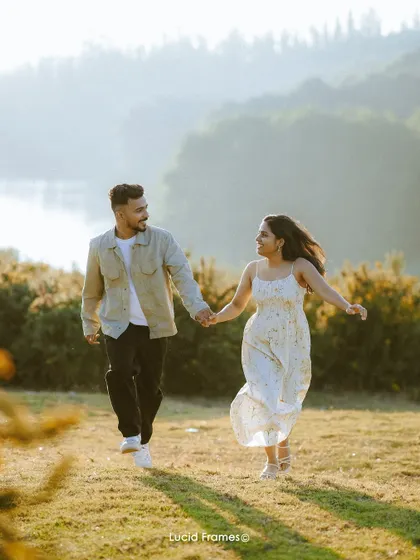 Another angle of their joyful walk, capturing the movement of the bride's dress and their shared laughter.