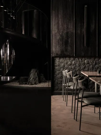 A collection of atmospheric shots from Lair, showcasing the interplay of black concrete, glass blocks, polished steel, and dramatic lighting. Each image captures a fragment of the bar's mysterious and immersive character.