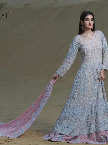 Another view of the magnificent peach with coral peach Indo-Western Gown, with its beautiful scallop design embroidery on a gorgeous georgette dupatta.