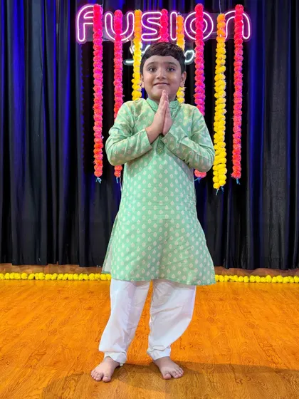 Our little performers dressed up and ready for their end-of-batch video shoot. We love seeing their confidence shine through.