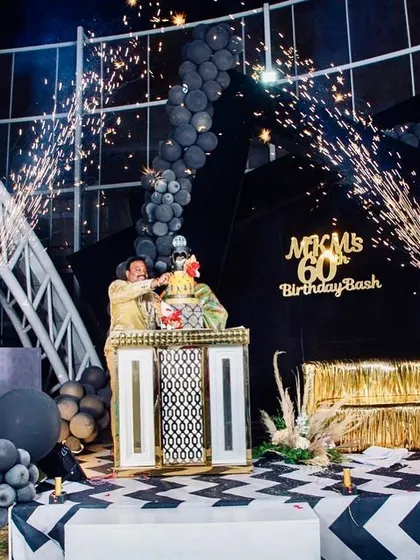 The cake cutting ceremony with a bang! We arranged for cold pyro fireworks to go off, adding a dramatic and celebratory touch to the 60th birthday moment.