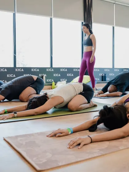 A moment of surrender in Child's Pose during a workshop. It's important to balance effort with ease in every practice.