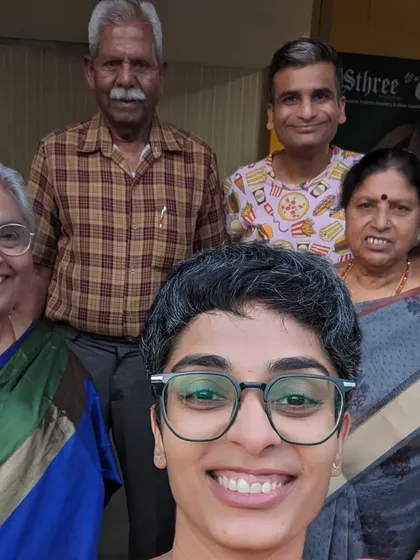 A group selfie with my former landlords and their family. Building strong community ties, both within and outside my events, is something I deeply value.