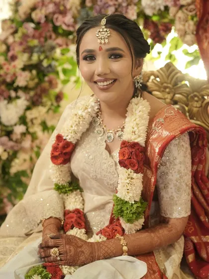 A beautiful portrait of the bride, looking serene and happy during the ceremony.