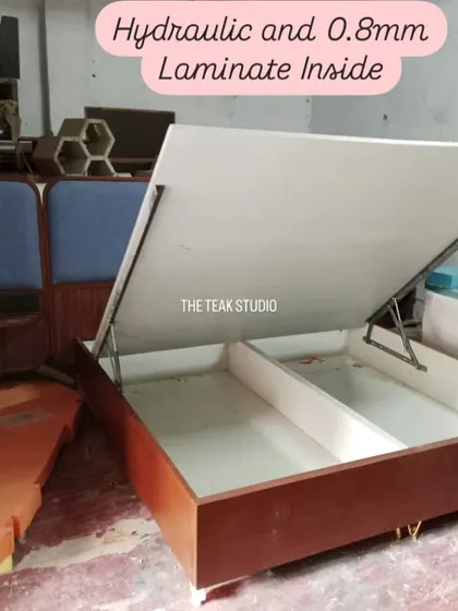 A look inside a hydraulic bed frame being built. I use quality laminates for the interior storage box to ensure it's durable and easy to clean.