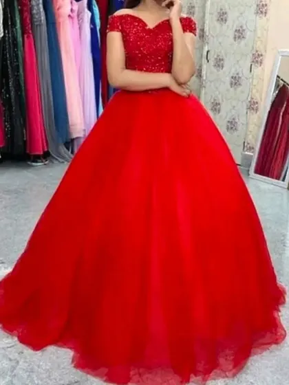 A catalog view of our off shoulder red ball gown. This classic princess style dress is a popular rental for pre-wedding shoots and parties.