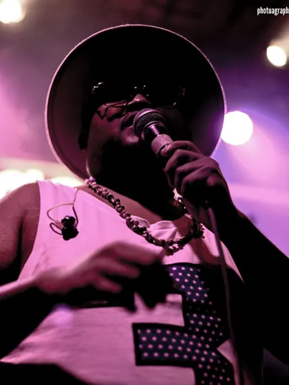 A close-up portrait from our Fandom show. The lights, the sweat, the emotion, it's all part of the live music experience.