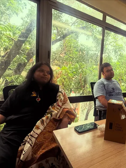 Participants listening intently during a character development session. The beautiful green view outside our window provides a calm backdrop for our deep and often intense discussions.