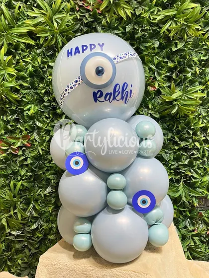 This Rakhi, I created this special Evil Eye themed balloon arrangement. The light blue colors and protective symbols offer a unique way to send your sibling love and good vibes.