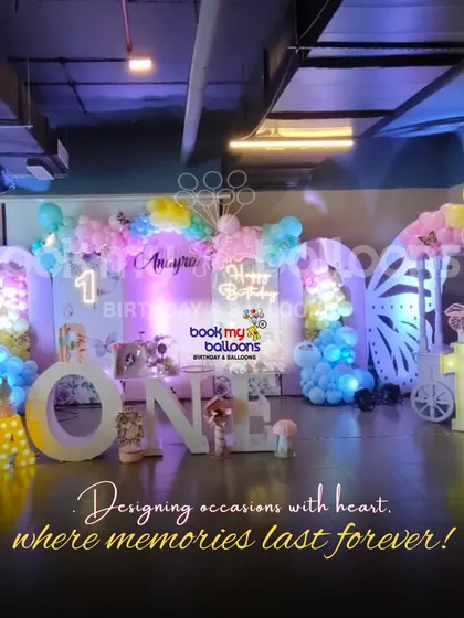 "Designing occasions with heart, where memories last forever." This beautiful butterfly themed first birthday for Amyra, with its soft lighting and marquee letters, embodies our commitment to creating heartfelt memories.