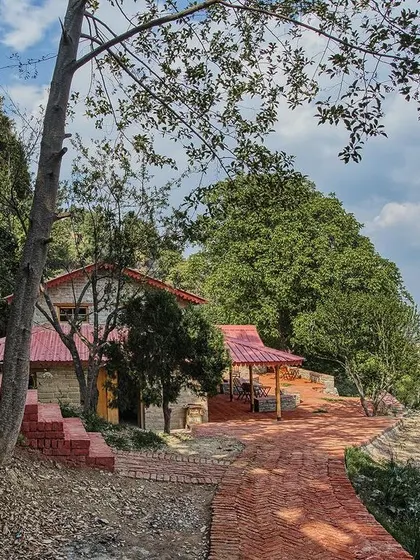 **Sargakhet Handicraft Centre, Uttarakhand:** We transformed a dilapidated British-era Post Office into a vibrant hub for local artisans. The project, overlooking the Mukteshwar valley, combines heritage conservation with sustainable tourism to support the local economy.