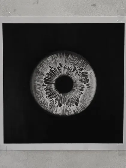 The final framed piece of my 'Iris' drawing. It looks like a planet or a galaxy.