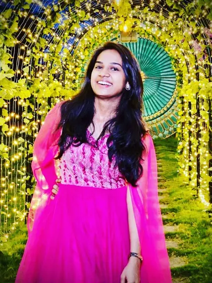 This fuchsia pink gown is perfect for anyone wanting to embrace the Barbie trend. It's a designer piece that will make you the center of attention at any party.