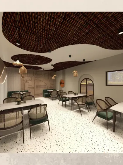 This perspective shows the length of the cafe, illustrating the consistent design language from the front to the back. The combination of woven ceiling panels, cane lighting, and terrazzo flooring creates a cohesive and inviting atmosphere.