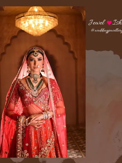Another full-length shot under a chandelier, emphasizing the majestic and timeless quality of this bridal style. The jewellery stands out even from a distance.