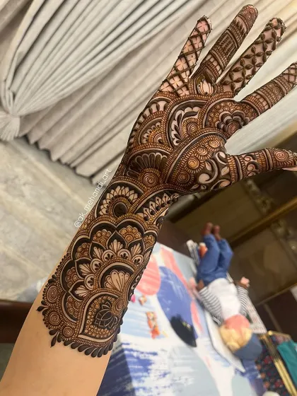 A beautiful back-hand design that extends up the arm, perfect for a bride or for a grand festive occasion.