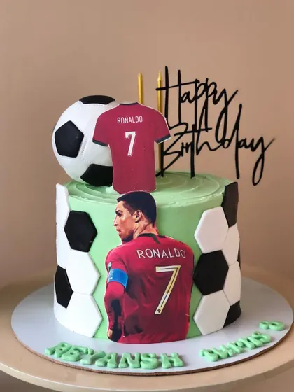 A Cristiano Ronaldo-themed cake for a fan of the football legend.