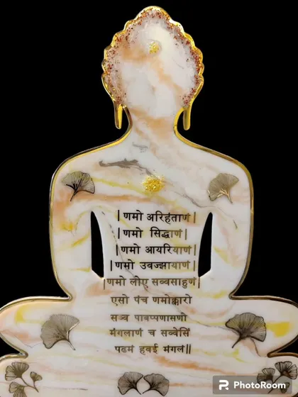 A finished Navkar Mantra in the shape of a meditating Buddha. This 2 by 3 feet piece is made on an MDF board with golden acrylic lettering and a beautiful, subtle resin pour.