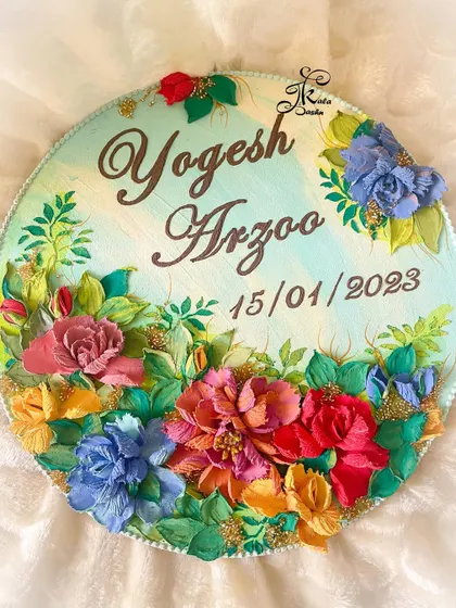 The full view of the "Yogesh & Arzoo" nameplate, a perfect anniversary or engagement gift with their special date included.