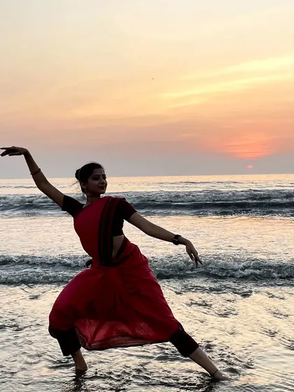 Another shot from my sunset dance session at the beach. The silhouette against the waves and the setting sun creates a dramatic and soulful image.