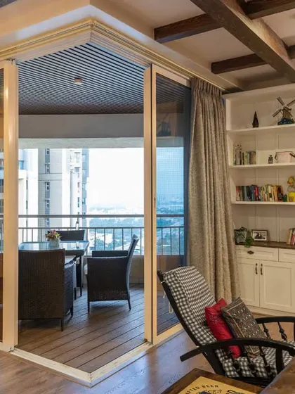 A beautiful balcony with a minimal design, fluted wooden ceiling, and a comfortable seating area, perfect for unwinding.