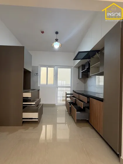Functionality is key in our kitchen designs. Here, you can see the deep drawers, soft-close mechanisms, and organized compartments that make our modular kitchens a joy to use every day.