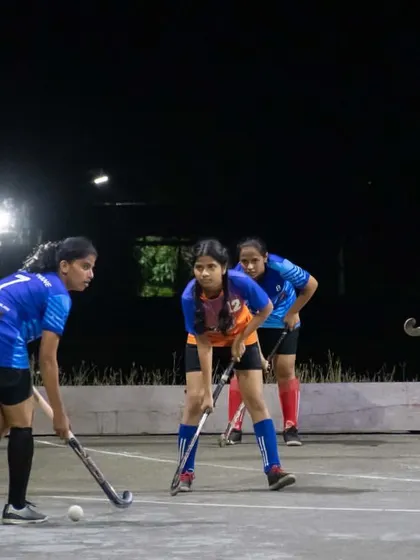 Two players ready for a face-off. This image captures the focus and anticipation before the play begins.