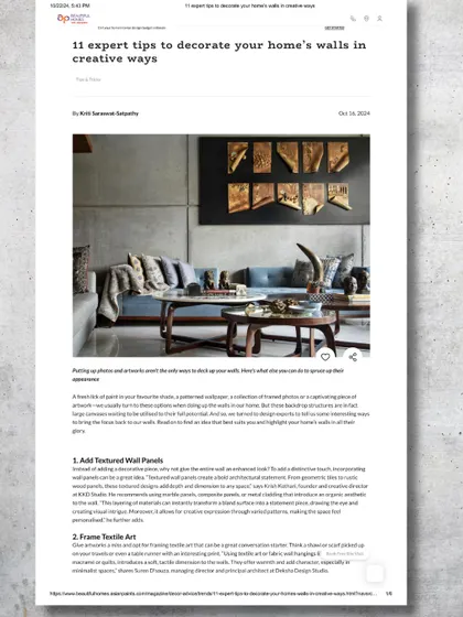 The opening page of the Beautiful Homes article, featuring one of our projects. We discuss adding textured wall panels, framing textile art, and using lighting to highlight key features.