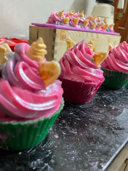 Another view of my Unicorn Cupcake soaps. The vibrant pinks and purples are created with skin-safe colorants, and each one is decorated by hand.