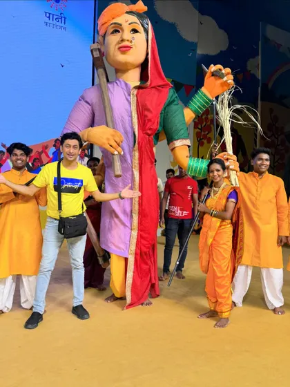 Posing with the giant Bali Raja puppet, which symbolized the victory of the farmer. The craftsmanship of our team was on full display.