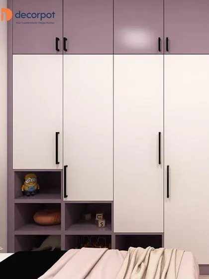 This two-tone hinged wardrobe in purple and white is a great example of playful yet practical design for a kid's room. It includes open cubbies at the bottom for easy access to toys and games.