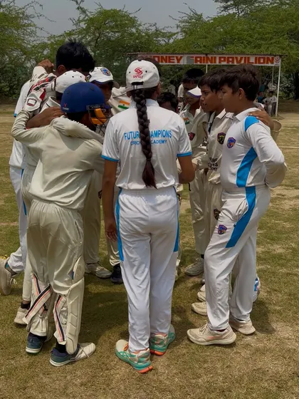 Our female captain leading the team huddle. We believe in leadership from everyone.