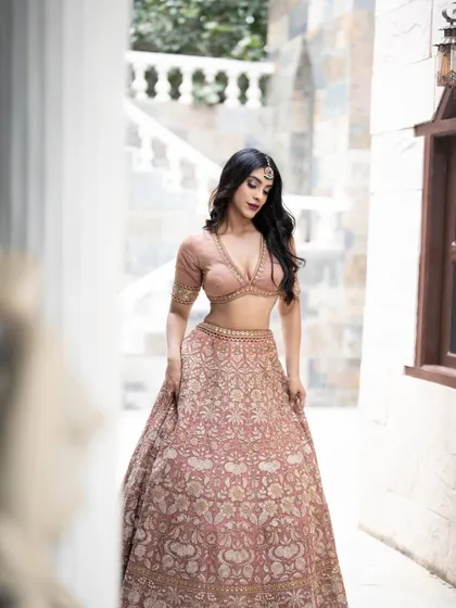 A full-length shot that captures the grace and elegance of this bridal look. The makeup is designed to be timeless and photograph beautifully.