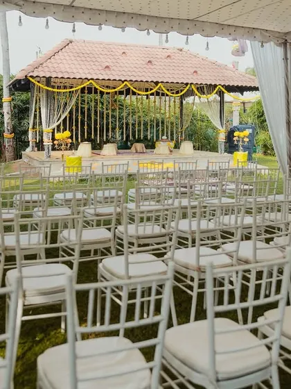 Guest seating arranged before the eco-friendly Haldi mandap, showing how we plan the entire event space for a cohesive and beautiful experience.