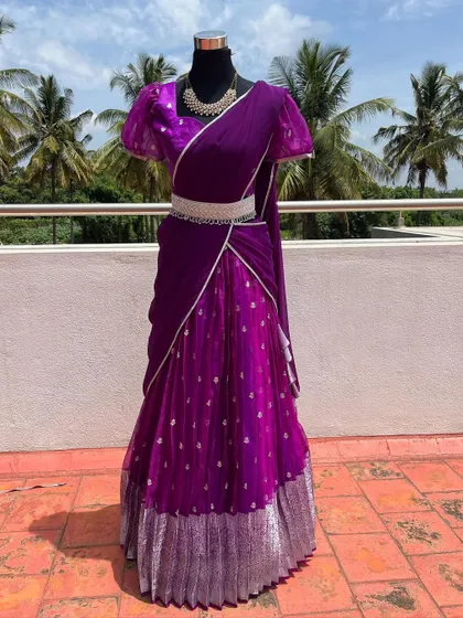 This modern half saree is a beautiful blend of traditional and contemporary styles.