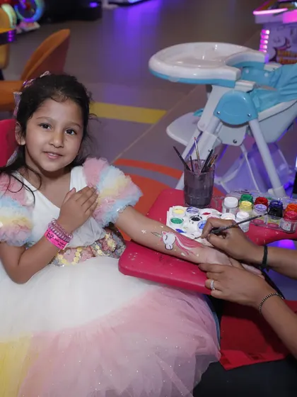 Adding a face and arm painting artist is a fantastic way to enhance a themed party and let kids express their creativity.