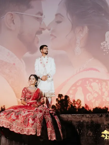 A romantic sunset shot from a post-wedding photoshoot, creating a dramatic and beautiful image.