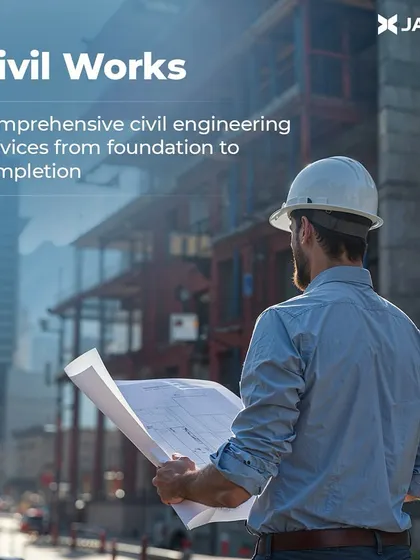 Our civil works capabilities form the foundation of our infrastructure projects. An engineer reviewing blueprints on-site demonstrates our comprehensive approach, managing every detail from the ground up to ensure structural integrity and excellence.