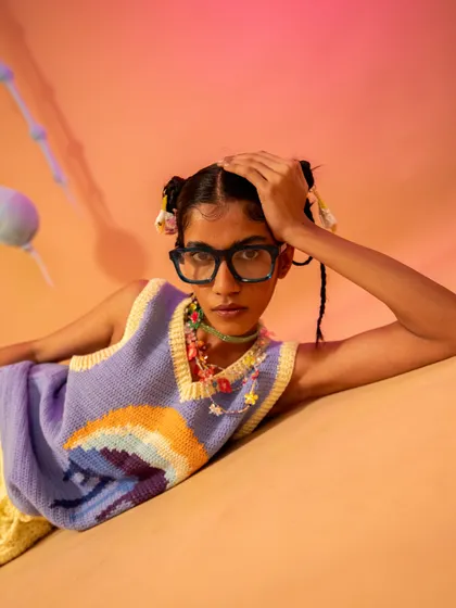 Another look from the Ratalove shoot, featuring a knit vest and quirky glasses. This highlights my skill in creating bold, colorful, and character-driven looks for brands.