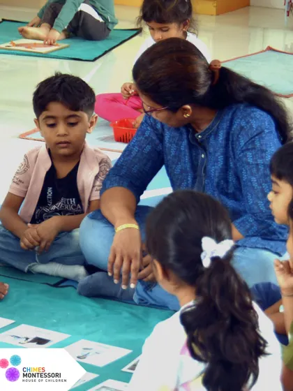 Respect is foundational at Chimes. An adult sits on the floor with the children, listening to them and valuing their thoughts, modeling the behavior we want to see.