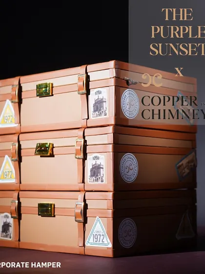 A graphic showcasing the Copper Chimney collaboration. These narrative-driven gifts are perfect for brand anniversaries and heritage campaigns.