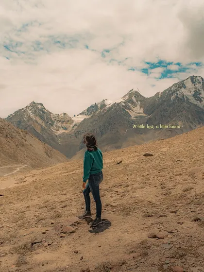 A self-portrait looking out over the mountains at Kunzum Pass. This image combines a sense of adventure with a feeling of introspection.