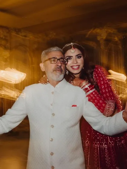 A beautiful moment between the bride and her father. These family interactions are some of the most precious memories from a wedding day.
