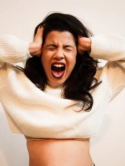 An expressive portrait capturing raw emotion. For this conceptual shoot, we worked on conveying a powerful feeling through expression and body language.
