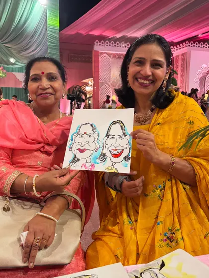 A mother-daughter duo with their charming caricature, a shared memory from a family wedding.