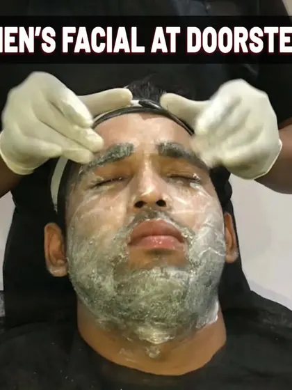 A men's facial at your doorstep is the ultimate convenience. This client is receiving a full facial treatment, including a relaxing massage with professional products, to achieve a clean and glowing complexion.