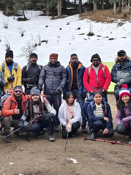 The team before the summit push. Our first Kedarkantha batch, all geared up and ready to take on the final ascent from our base camp.